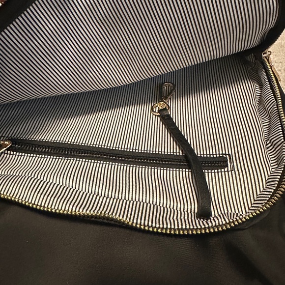 Black Minimalist Backpack with Gold Accents - Picture 8 of 12